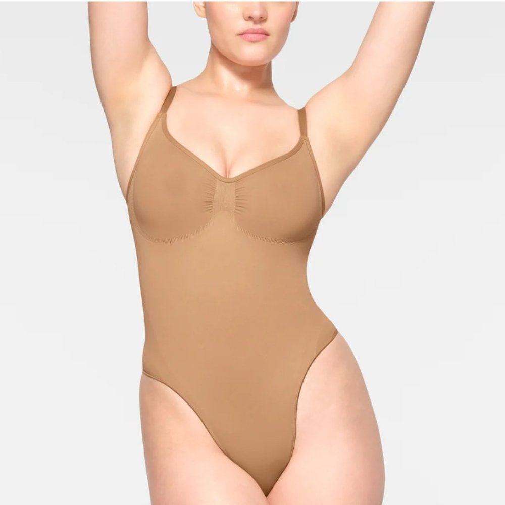 New Skims Seamless Sculpt Thong Bodysuit in Ochre